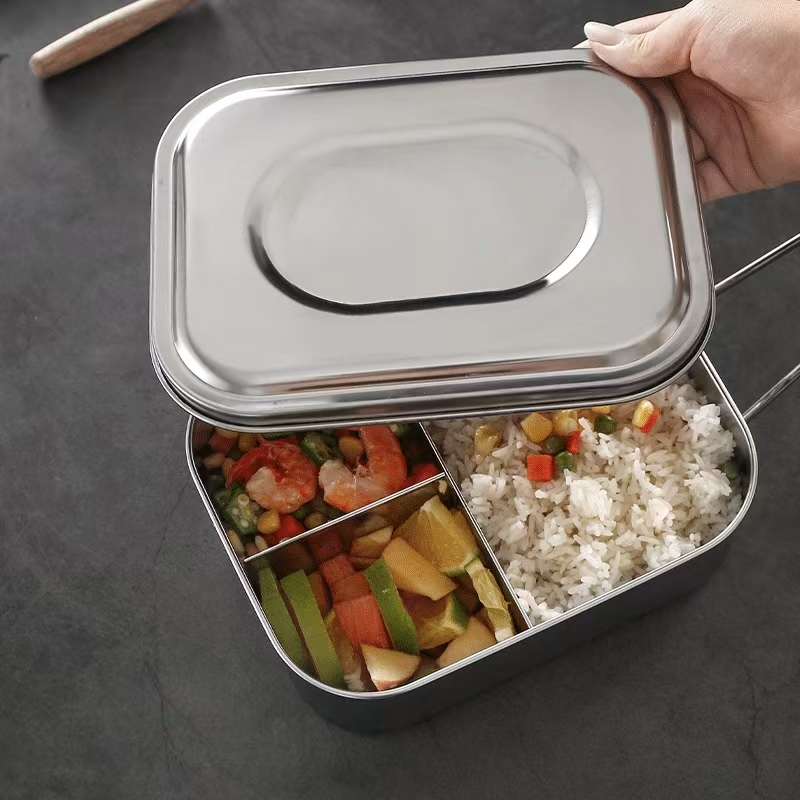 Rectangular stainless steel lunch container with compartments and lid