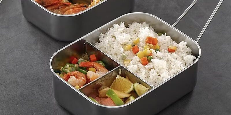 Rectangular stainless steel lunch container with compartments and lid