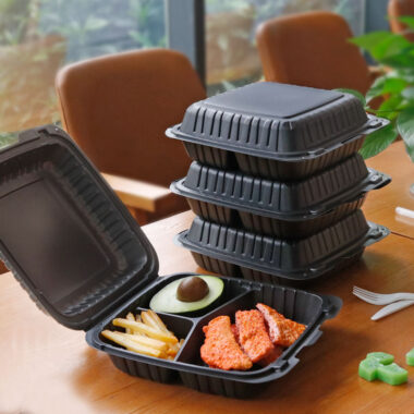 Black plastic food container with lid for restaurant takeaway