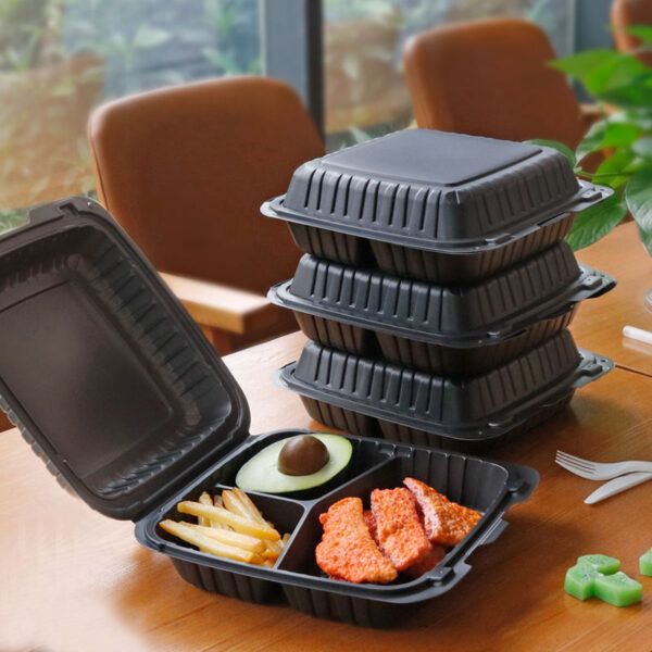 Black plastic food container with lid for restaurant takeaway