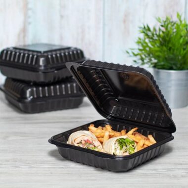 Black plastic food container with lid for restaurant takeaway
