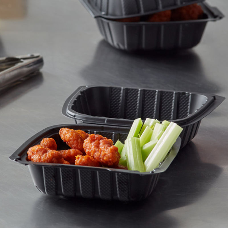 Black plastic food container with lid for restaurant takeaway