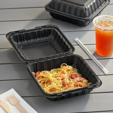 Black plastic food container with lid for restaurant takeaway