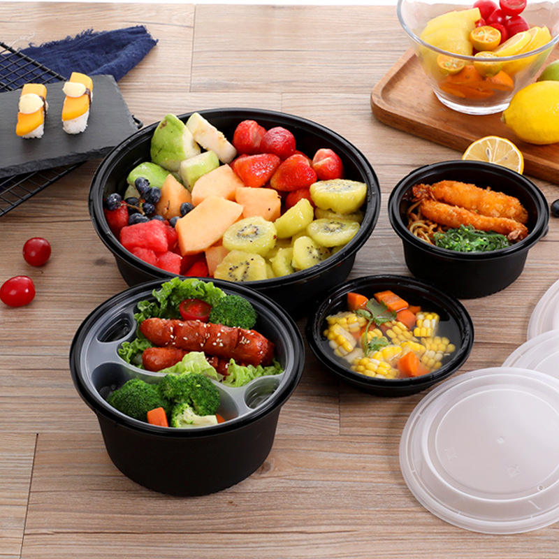 Round plastic food container with lid for salad and lunch packaging